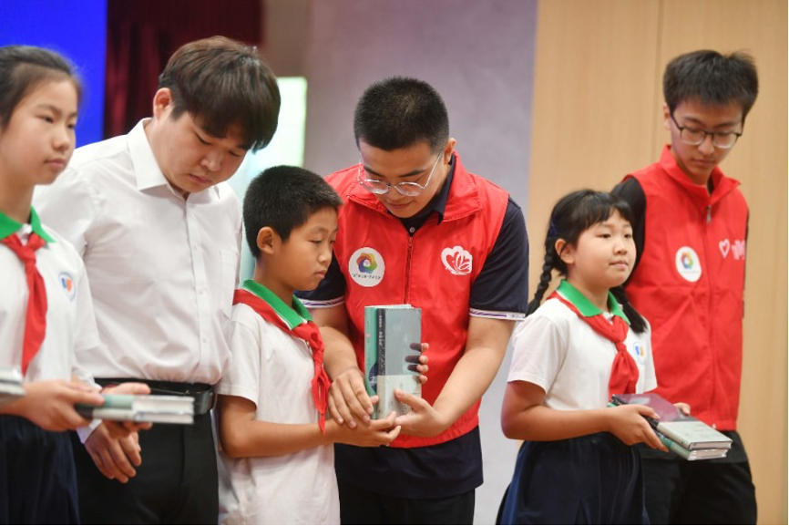 20230905-清华大学“‘京’彩文化 青春绽放”行动暑期活动纪实-供图-“书香未来”志愿行启动仪式现场.png